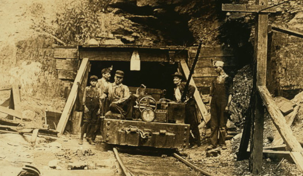 Entrance to a W. Va. coal mine: a "drift" mine. The live-wire was only shoulder -high in places inside, and unprotected. Location: West Virginia.