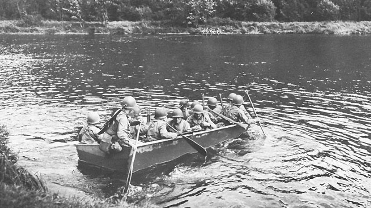 Members of 2d Battalion, 11th Infantry, cross the river at Dornot, September 1944.