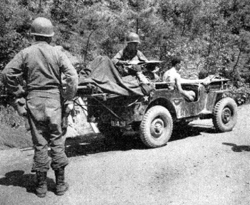 Men of the 24th Medical Battalion evacuate a wounded soldier in Korea, 1950. (Source: academic.oup.com)