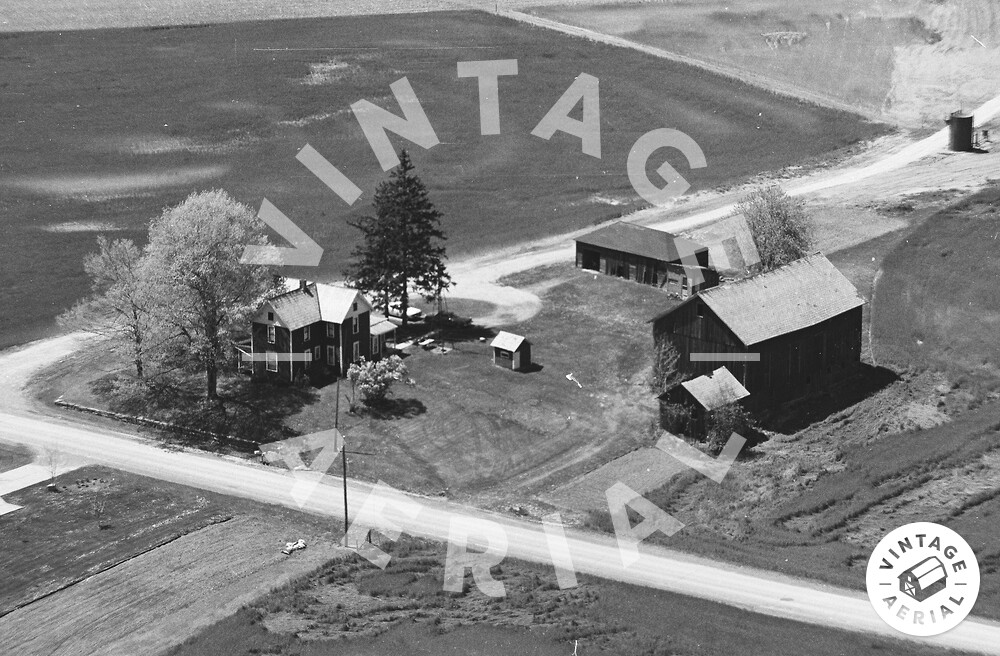 View of the Hickman House and outbuildings taken in 1982. (Source: vintageaerial.com)