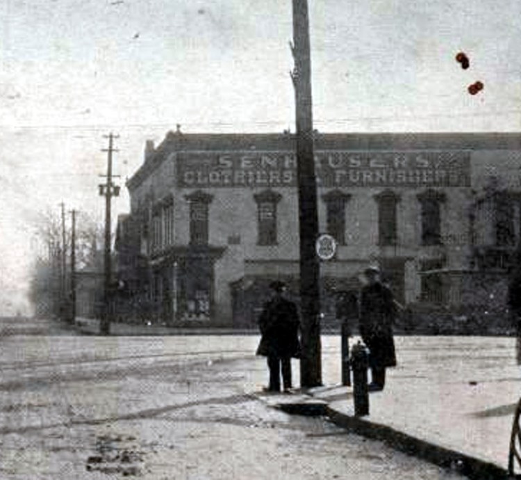 The southwest quadrant of New Philadelphia's Public Square showing Senhauser's store and the location of John Crescio's fruit stand, from a postcard, 1910. (Source: ebay.com)