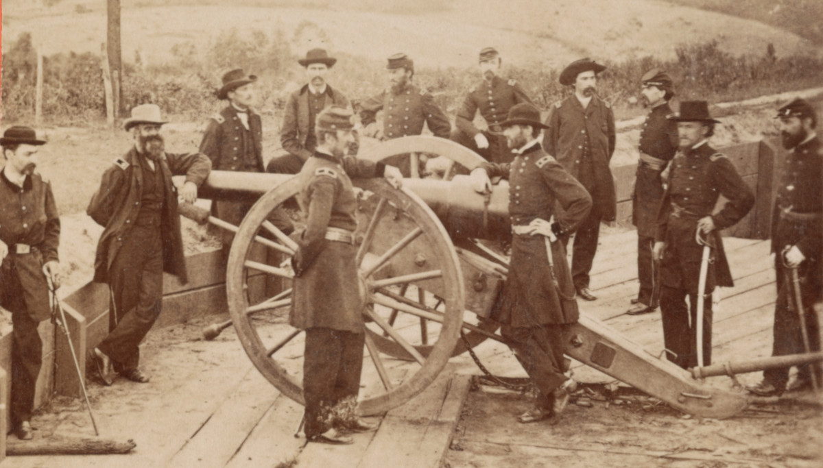 Maj. Gen. Sherman and staff This view was taken in the trenches before Atlanta, Ga. Stereograph shows Sherman standing with officers next to cannon before siege of Atlanta in 1864. (Source: loc.gov)