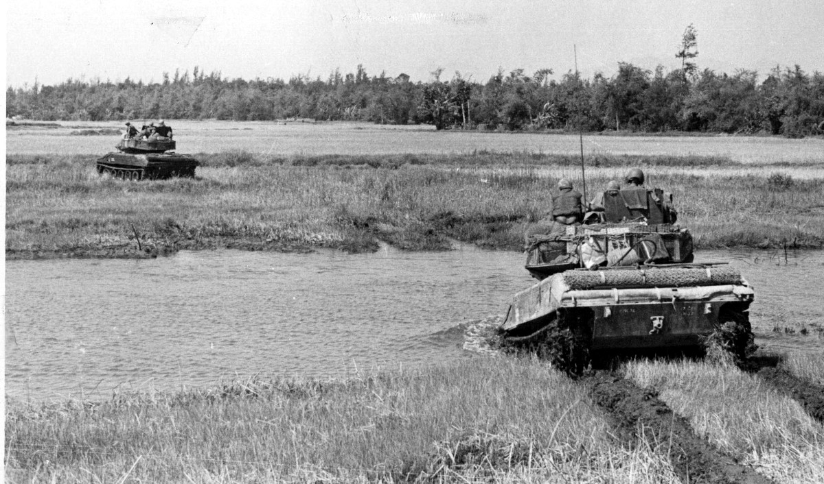 Sheridan Tanks from H Troop, 17th Cavalry, 198th Infantry Brigade of the Americal Division, cross the Song Diem River during Operation Nantucket Beach, about 10 miles northeast of Quang Ngai, Vietnam.