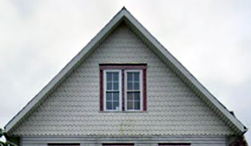 The decorative shingle feature popular with Queen Anne style homes found on the gable end of the Eberhardt House, 2019. (Source: google.com)