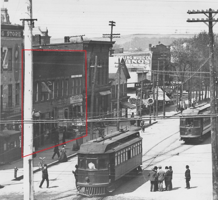 This image from the Carpenter Collection of the Tuscarawas County Historical Society shows the brick block of buildings built by Ernest Schmidt on the west side of North Broadway, c. early 1900s. (Source: Courtesy of the Tuscarawas County Historical Society)