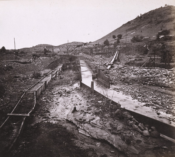 Photograph of a flume used in placer mining at Brown's Flat, California, 1870s. Courtesy of Society of California Pioneers. (Source: oac.cdlib.org)
