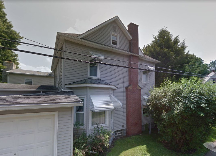 The Metzger House on North Avenue NE in New Philadelphia, 2014. (Source: google.com)