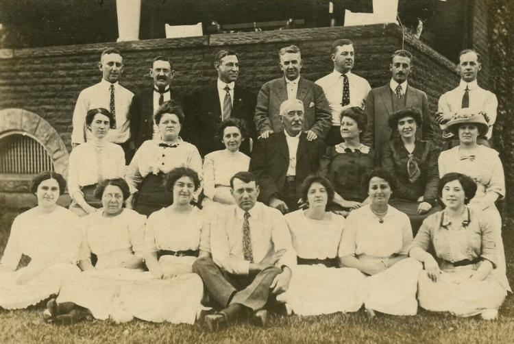 The Beyer-Alexander wedding party pictured in front of the Alexander House on North Broadway, New Philadelphia, Ohio, August 1913. (Source: ebay.com)