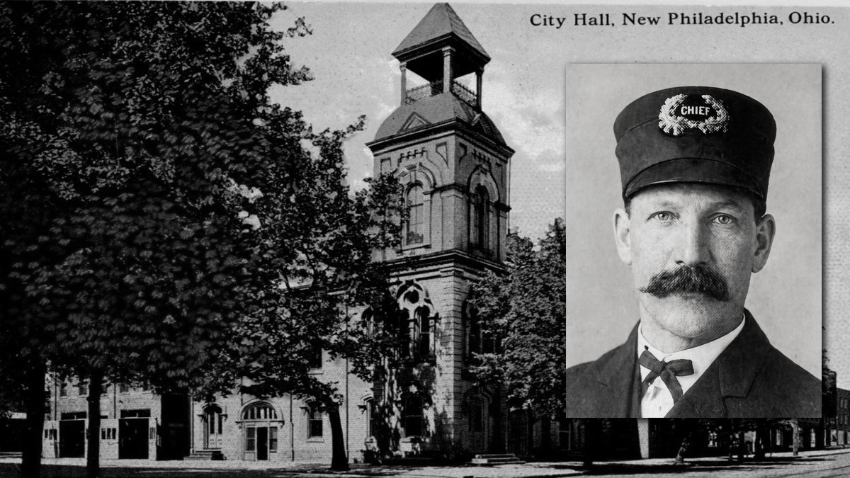 Image of New Philadelphia, Ohio City Hall with an image of Chief of Police Abraham Espich.